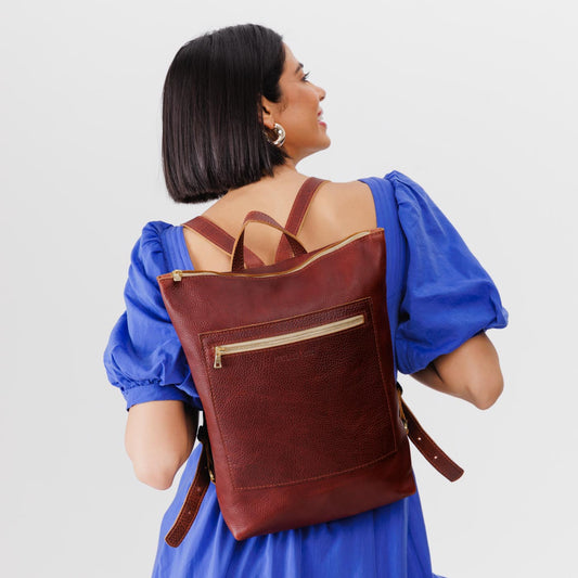 All Color: Cinnamon Bear | Model wearing rectangular slim leather backpack