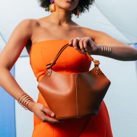 Honey*Small | Structured bucket shaped handbag with an adjustable shoulder strap