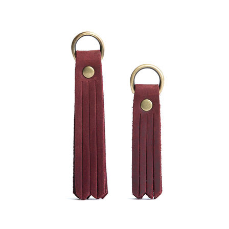 All Color: Merlot | slim leather tassel with brass ring