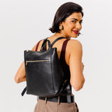 All Color: Black | Model wearing square slim leather tote backpack