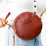 Nutmeg Small | Circle shaped crossbody bag with top zipper